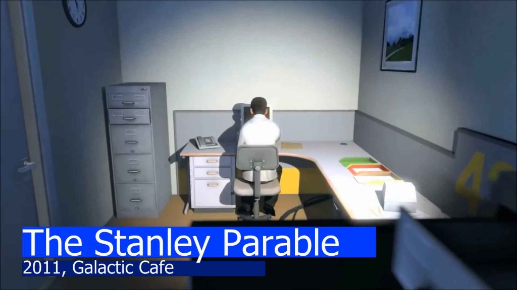 Stanley, sitting at his desk