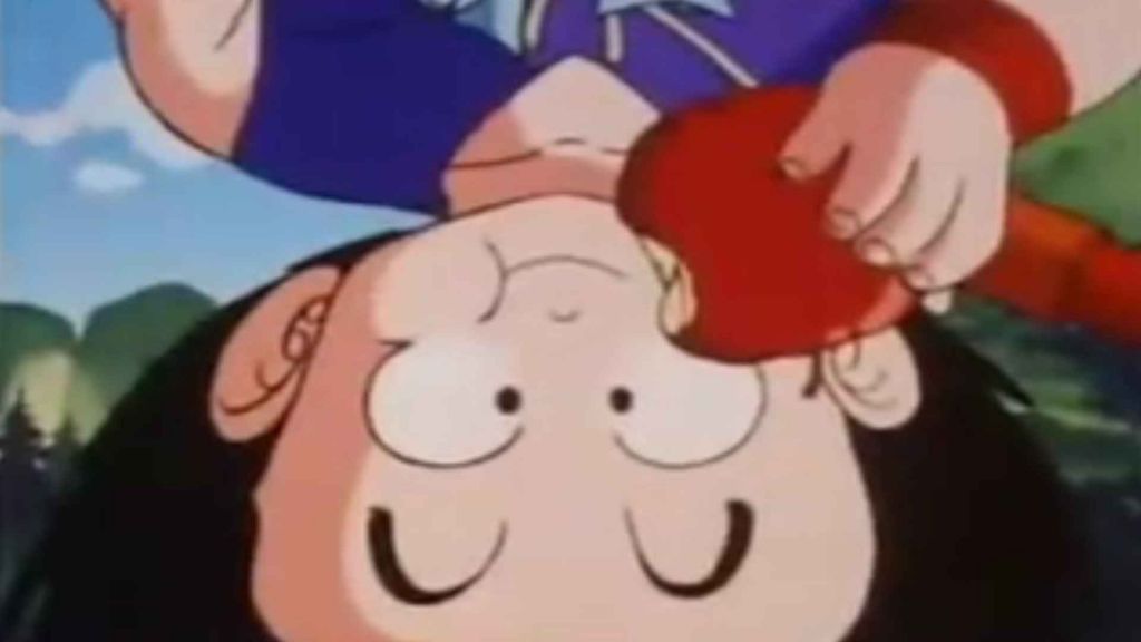 Son Goku eating an apple upside-down