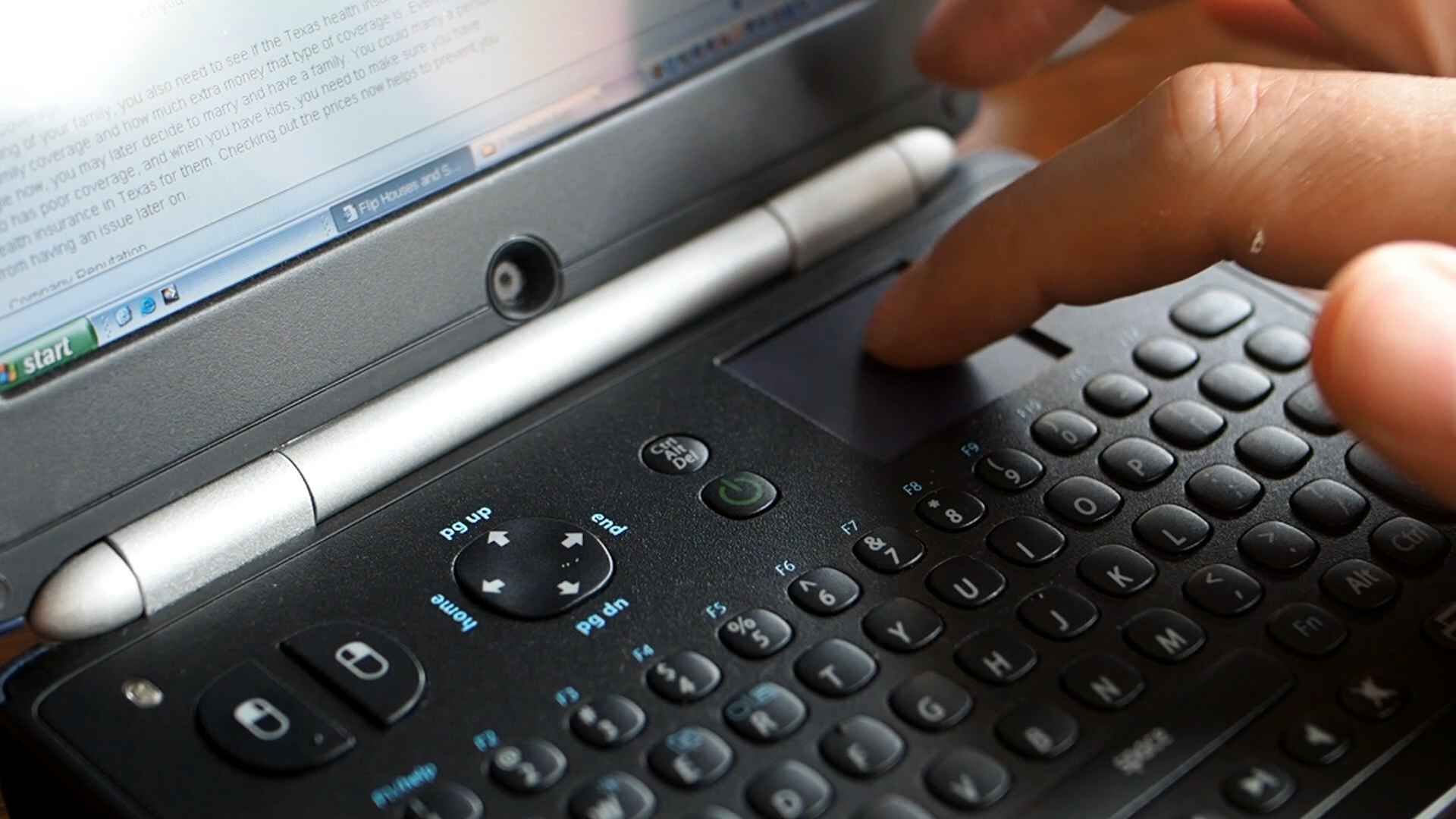 FlipStart keyboard, showing the trackpad in use