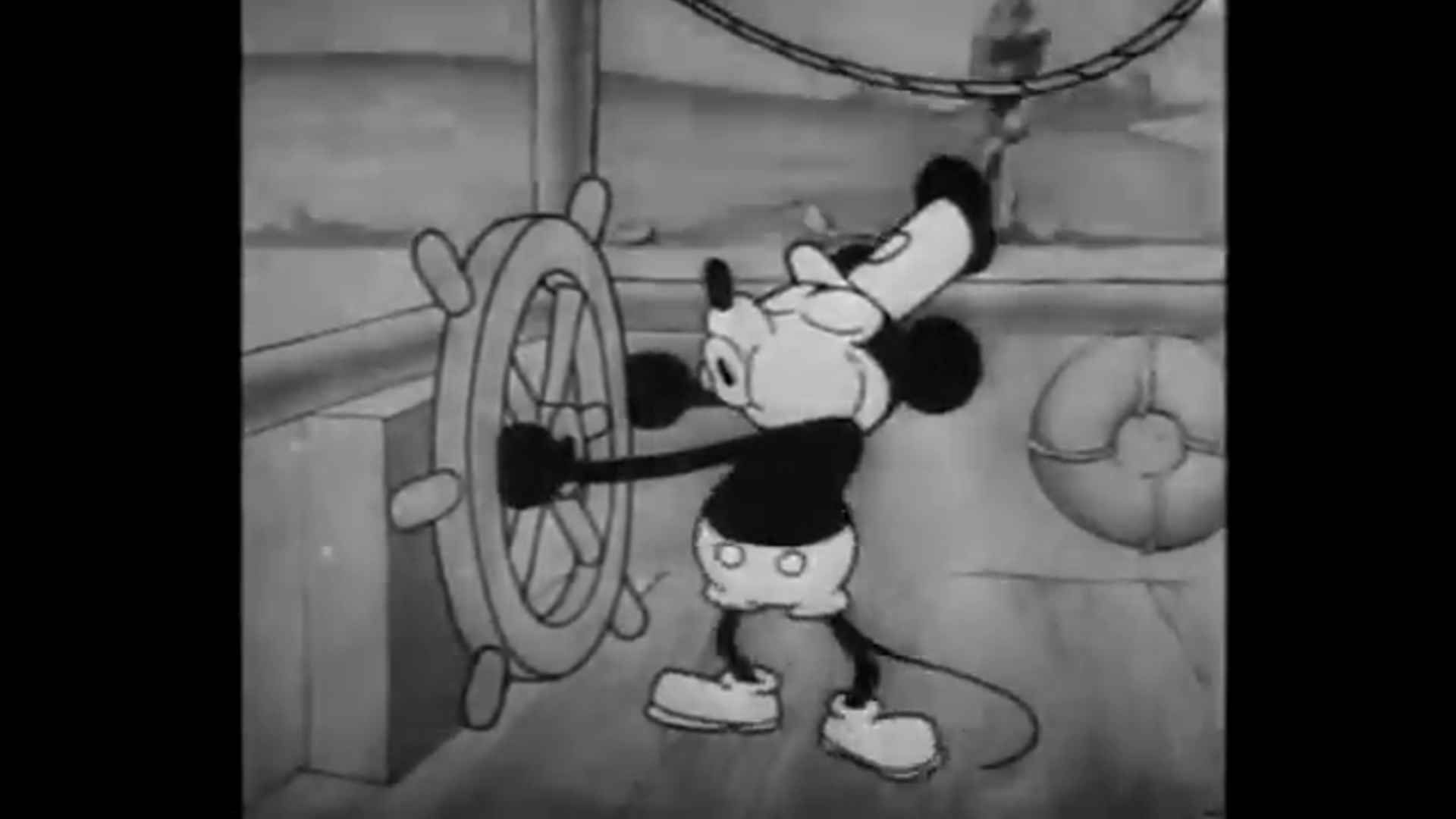 Mickey Mouse whistling on Steam Boat Willie. With no suspenders.