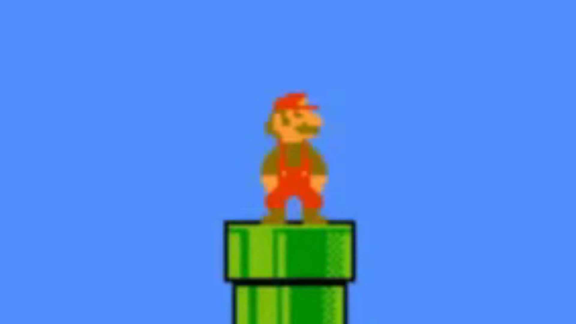 Mario standing on a pipe