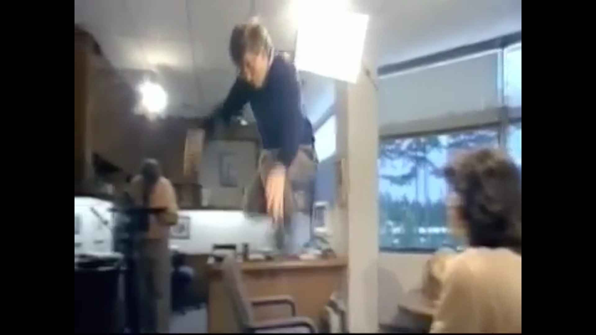 Bill Gates jumping over an office chair