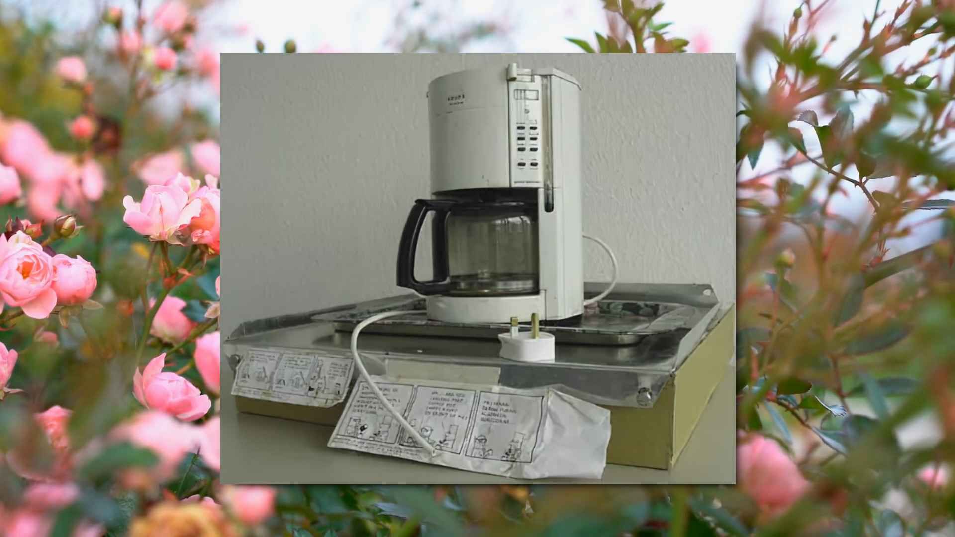 The Trojan Coffee Machine on a floral tray, without the UK plug attached