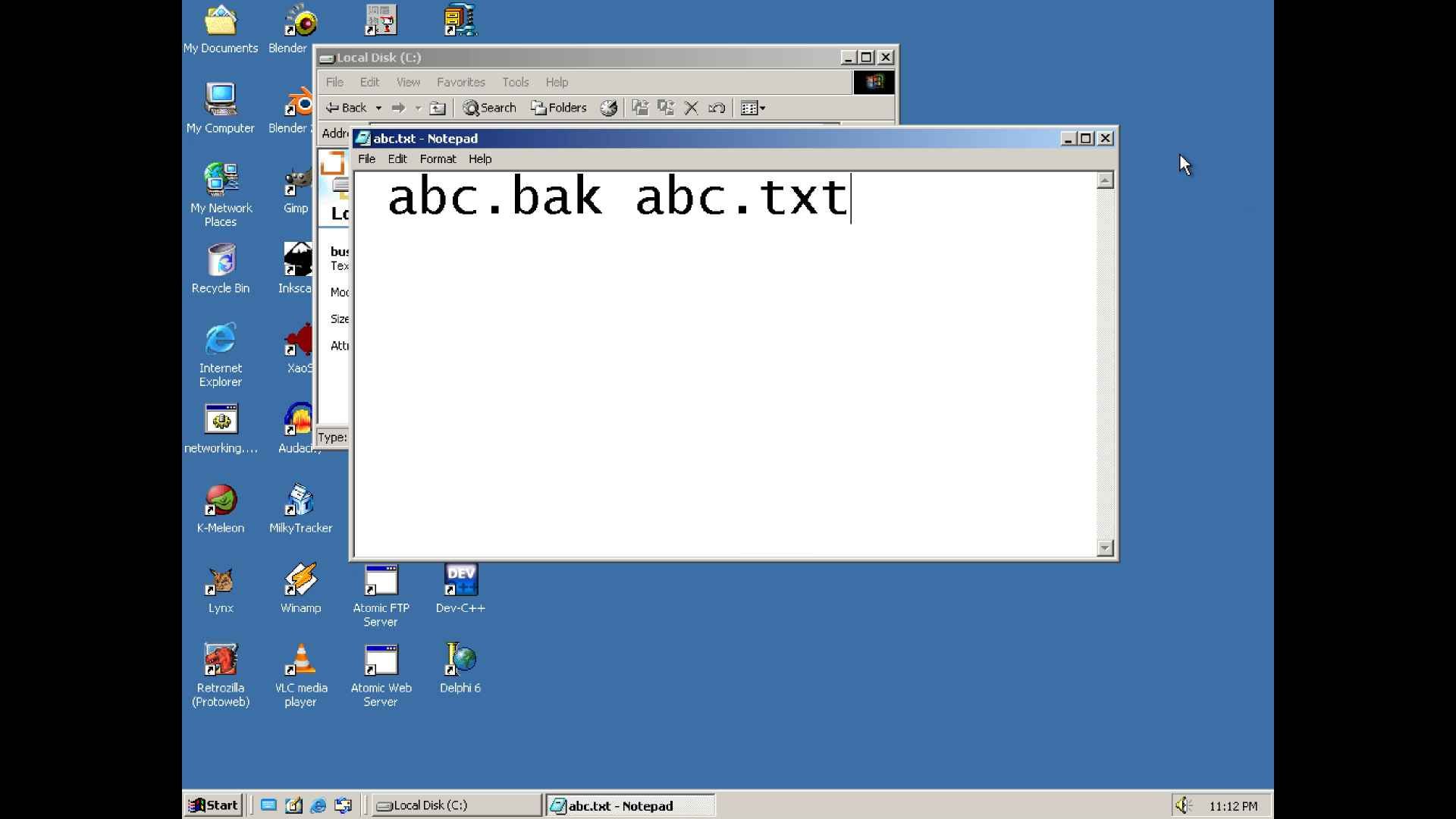 A notepad file showing " abc.bak abc.txt"