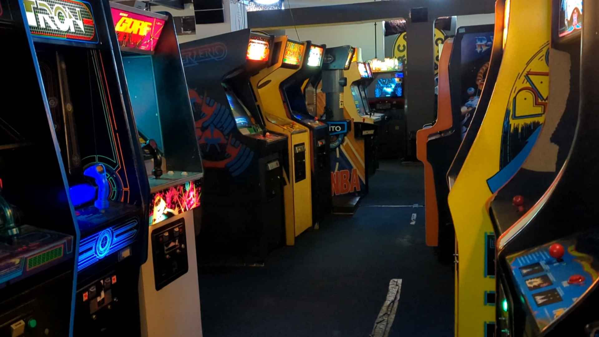 Berzerk in an arcade surrounded by other machines