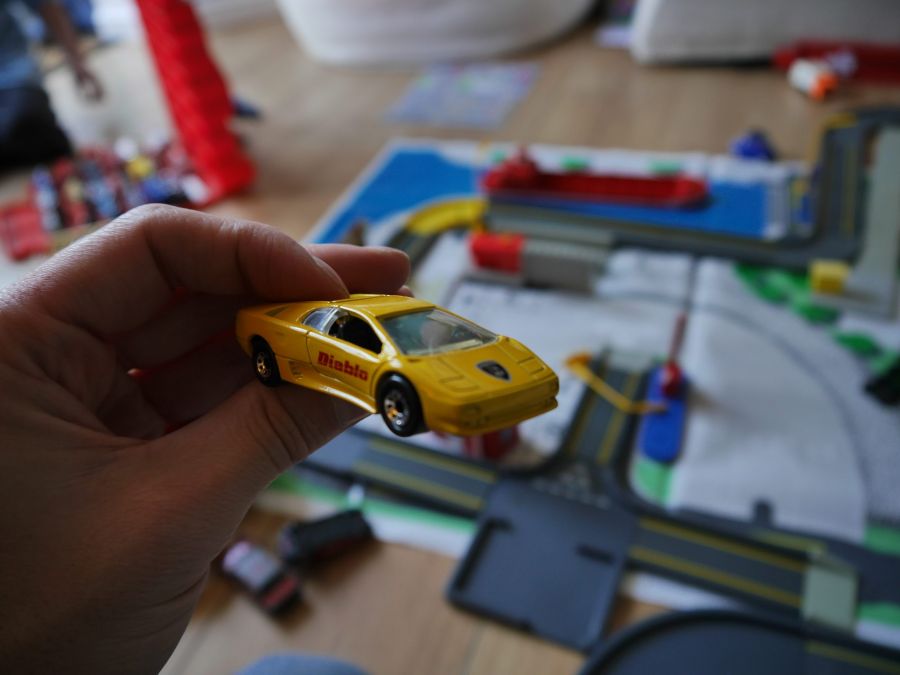 Lamborghini Above a Matchbox City